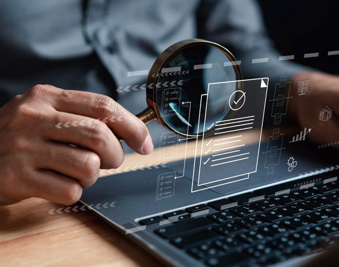 문서 아이콘을 '돋보기'로 유심히 보고있는 이미지다.