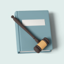 책 위에 판사봉이 놓여 있다.